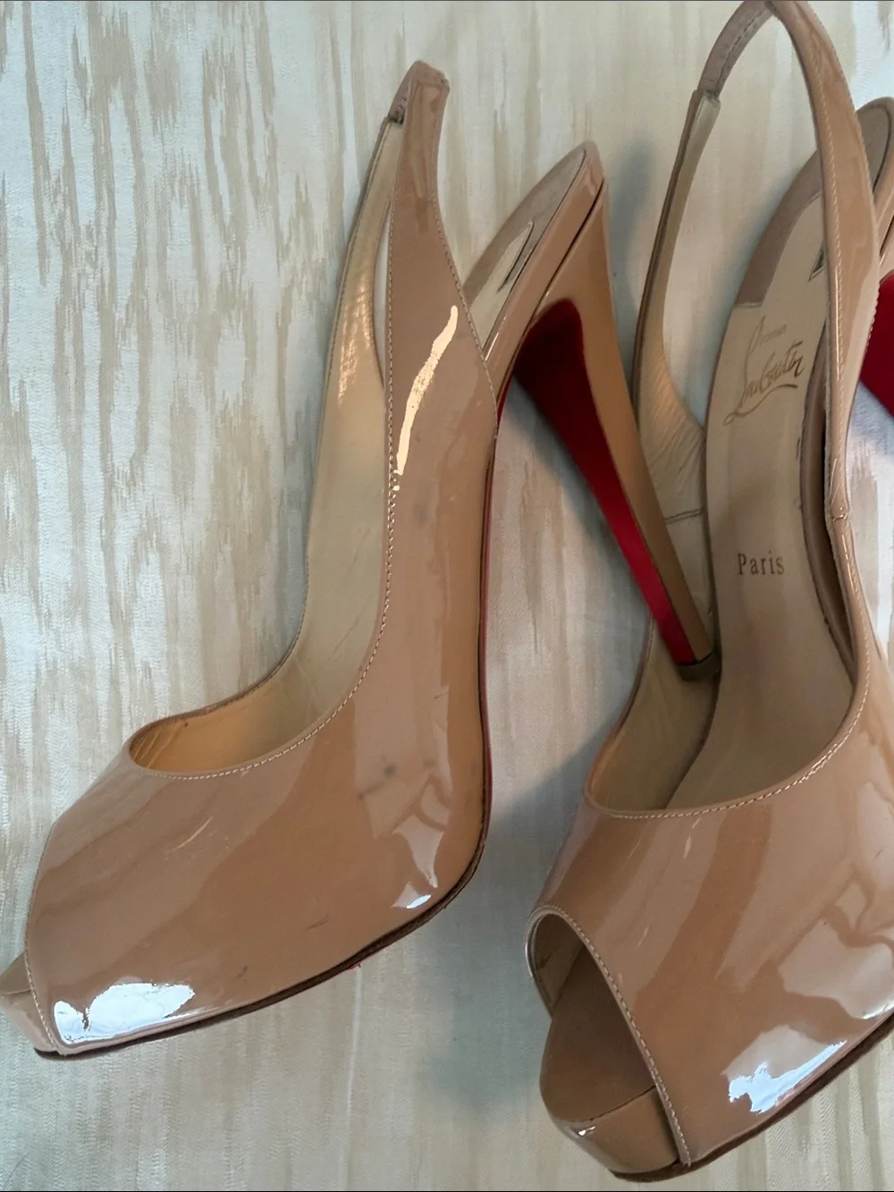 Christian Louboutin glossy beige